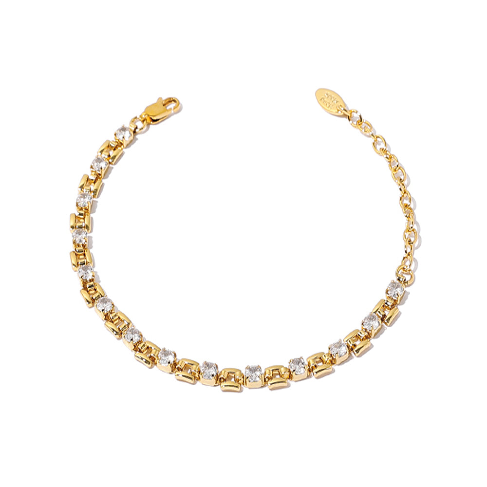 The image shows a chic 18K gold-plated brass bracelet featuring square zircon stones with a lock clasp. Its minimalist design with sleek lines and square zircon stones gives it a cool luxe look, perfect for daily wear or casual outings. This bracelet from Chicblingbabe is ideal for modern women who appreciate subtle luxury and fashion-forward accessories.