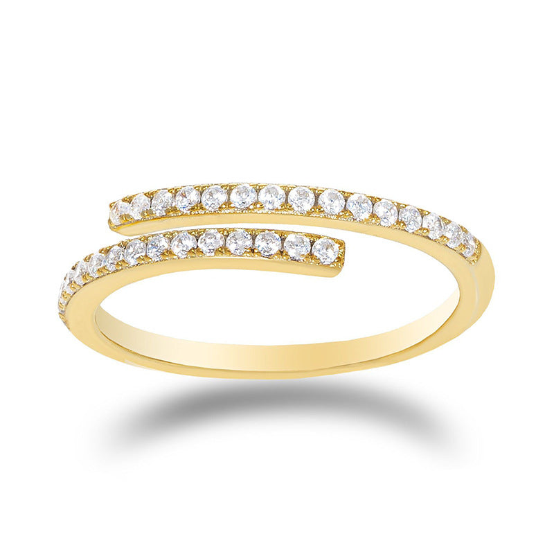 A model's hand styled with a double row cubic zirconia cuff ring in polished S925 silver, layered with thin delicate rings for contrast. The bold geometric design catches light dramatically, perfect for creating viral Instagram reels or elevating cocktail party outfits with modern edge.