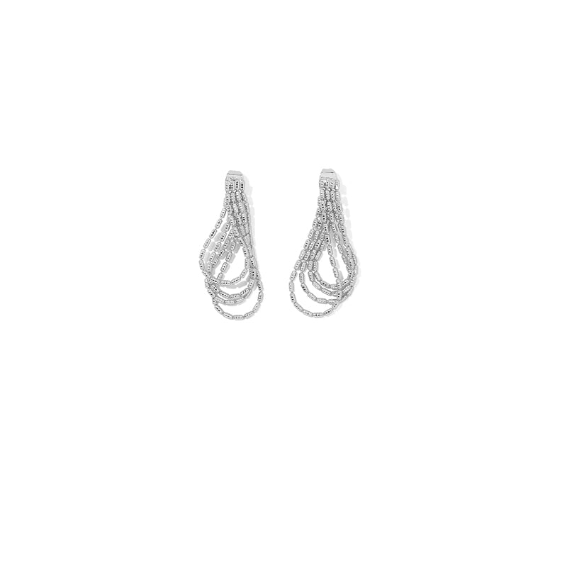 This image features a pair of chic tassel earrings made with 18K gold-plated brass. The earrings have a trendy, stylish design perfect for enhancing any outfit. Ideal for various occasions like casual wear, parties, or evening events, these fashion tassel earrings from Chicblingbabe offer a bold and elegant statement.