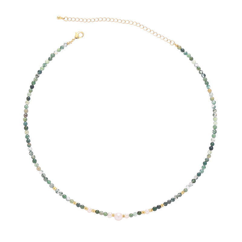 This image features the ChicBlingBabe gold-toned layered necklace designed with natural pearls, abalone shell, and irregular stones, perfect for beachside vacations or summer boho fashion with its ocean-inspired elegance.