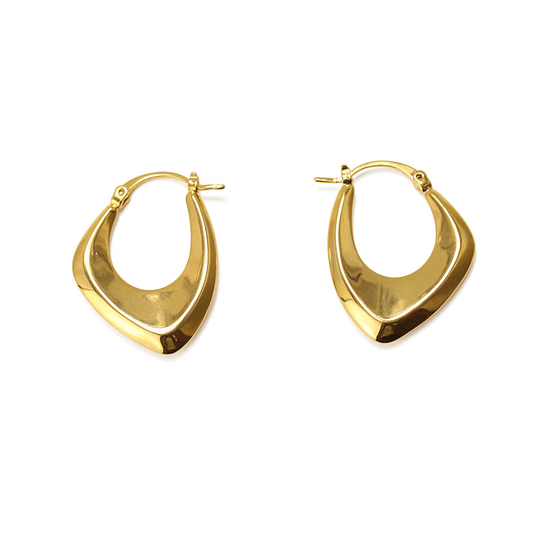 This image showcases a pair of minimalist geometric metal earrings with a sleek, modern design. The polished gold finish enhances their sophisticated appeal, making them a perfect choice for daily wear or elegant evening occasions. Their ear cuff style adds a trendy touch, seamlessly blending contemporary fashion with understated elegance. Ideal for those who appreciate unique statement jewelry with a minimalist aesthetic.