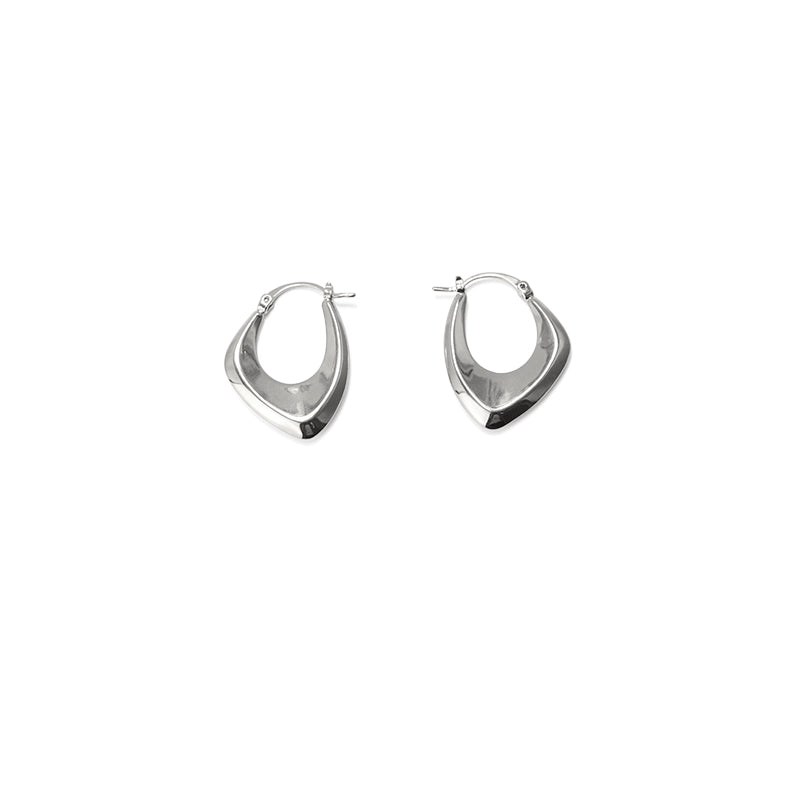 This image showcases a pair of minimalist geometric metal earrings with a sleek, modern design. The polished gold finish enhances their sophisticated appeal, making them a perfect choice for daily wear or elegant evening occasions. Their ear cuff style adds a trendy touch, seamlessly blending contemporary fashion with understated elegance. Ideal for those who appreciate unique statement jewelry with a minimalist aesthetic.