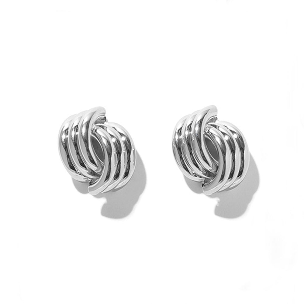 The image showcases a pair of gold minimalist line stud earrings with an artistic, sleek design. Their unique geometric structure and polished finish make them a perfect accessory for casual, work, and elegant evening looks, adding a modern and refined touch.