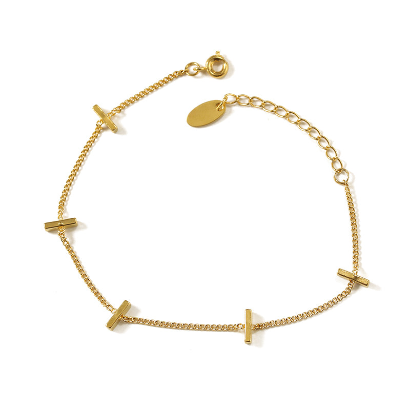 This minimalist gold bracelet showcases a sleek and versatile design, making it a perfect accessory for both casual and formal outfits. The stylish wristwear adds a touch of elegance and sophistication, enhancing any look effortlessly.
