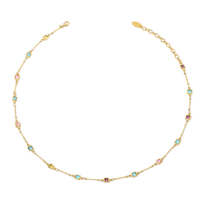 This image showcases a delicate rainbow glass bead necklace with evenly spaced multicolored beads along a fine gold or platinum chain. The dainty and minimalist design makes it perfect for layering with other jewelry or wearing alone for a subtle statement. Ideal for daily wear, casual outings, or gifting, this trendy necklace adds a vibrant and elegant touch to any look.
