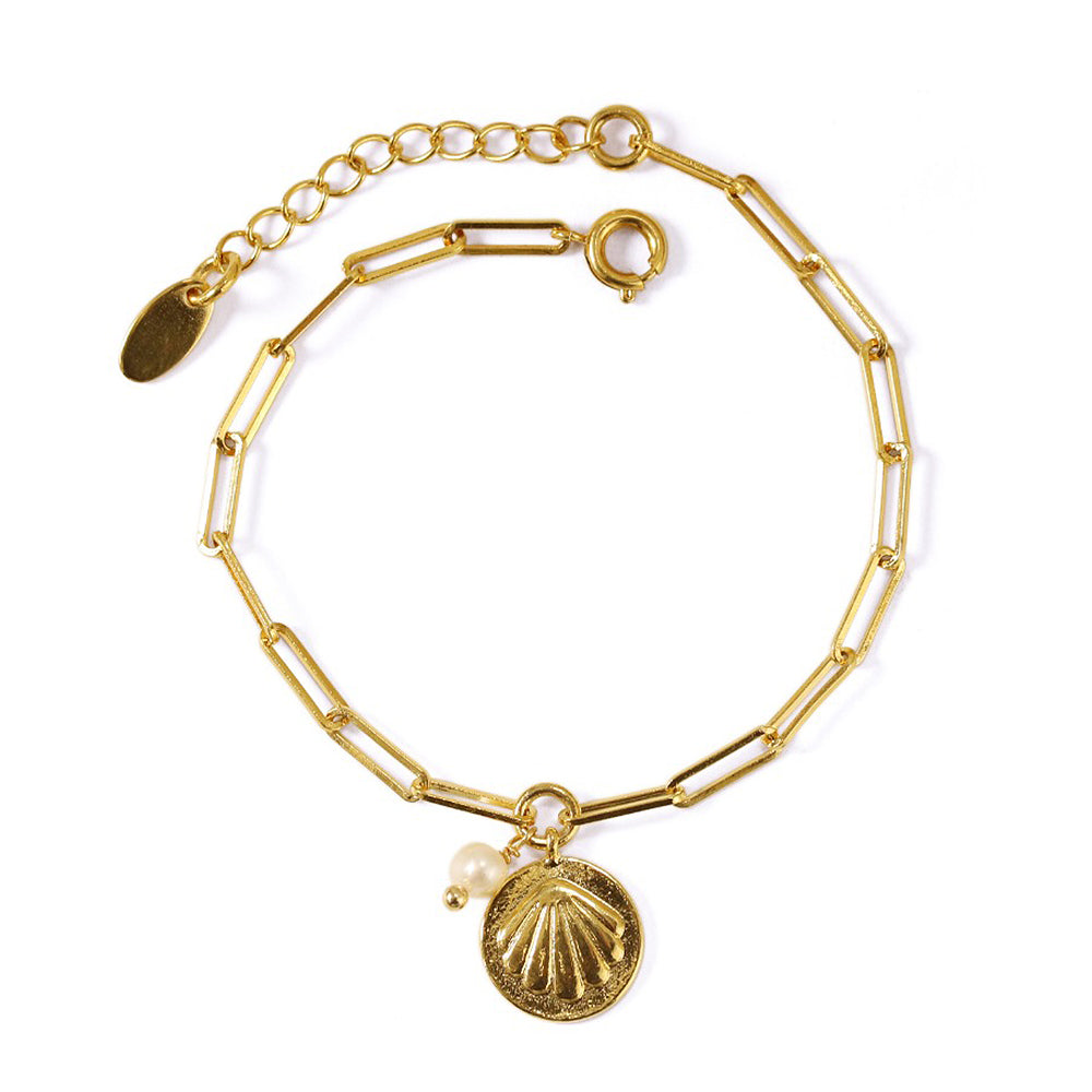 This image highlights the ChicBlingBabe Shell Pearl Charm Bracelet in a vintage-inspired gold finish, perfect for everyday elegance, minimalist style layering, or as a thoughtful gift for women who love timeless, coastal-inspired accessories.