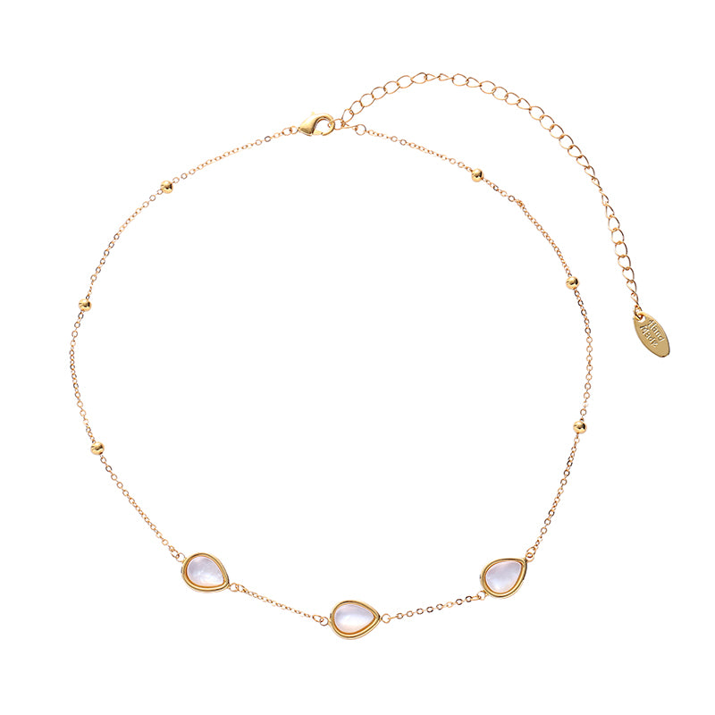 The image shows a ChicBlingBabe necklace featuring a layered design with freshwater pearls, a gold starfish charm, and a mother-of-pearl drop pendant in soft ivory tones, ideal for beach days, tropical vacations, or summer brunch styling.