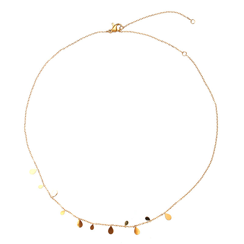 This elegant tassel teardrop pendant necklace from ChicBlingBabe features a minimalist gold design with a delicate long chain, making it perfect for layering or wearing alone. Ideal for casual and formal occasions, this stylish necklace adds a subtle touch of sophistication to any outfit.