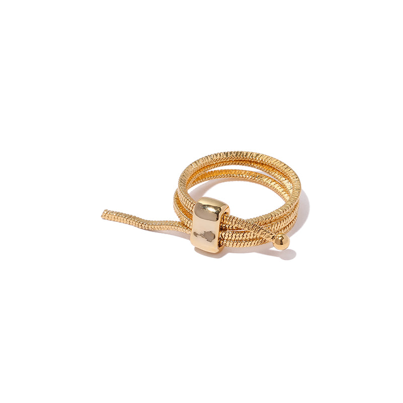 This stylish snake chain stacking ring from ChicBlingBabe features a sleek, adjustable layered design in a radiant gold-tone finish. Perfect for both casual wear and special occasions, this modern statement piece adds a bold and artistic touch to any jewelry collection, making it ideal for fashion-forward individuals.
