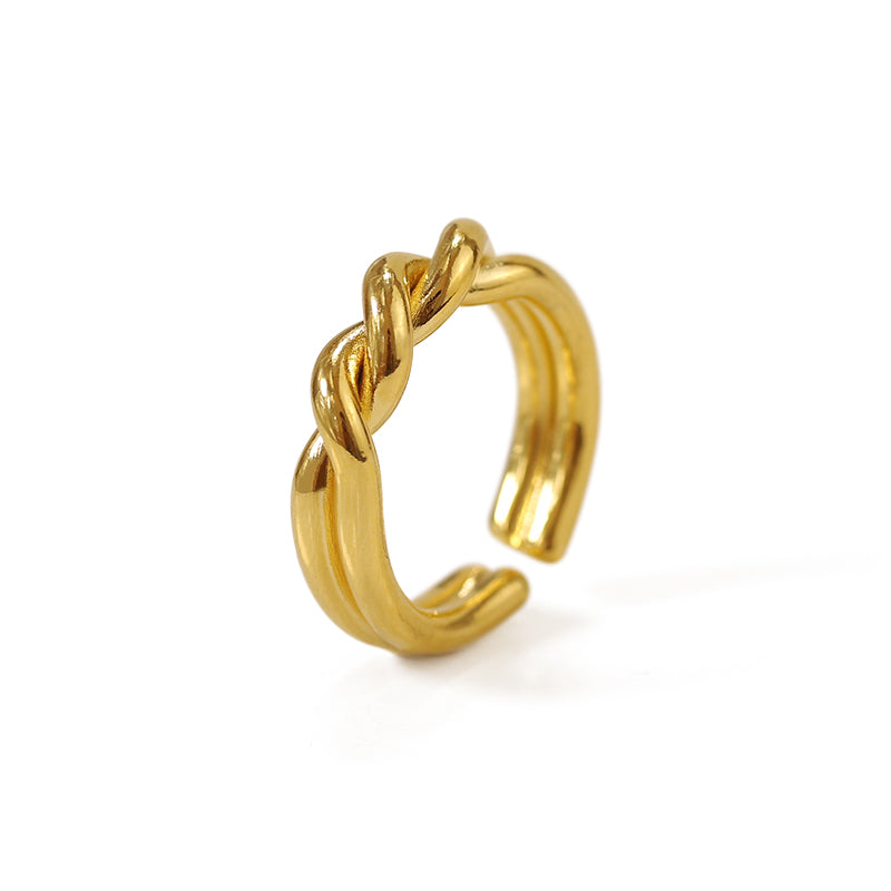 This photo features a sleek gold twist open ring from ChicBlingBabe, designed for stacking or wearing solo as a statement accessory, perfect for daily wear, gifting, or elevating minimalist fashion looks with a touch of golden elegance.