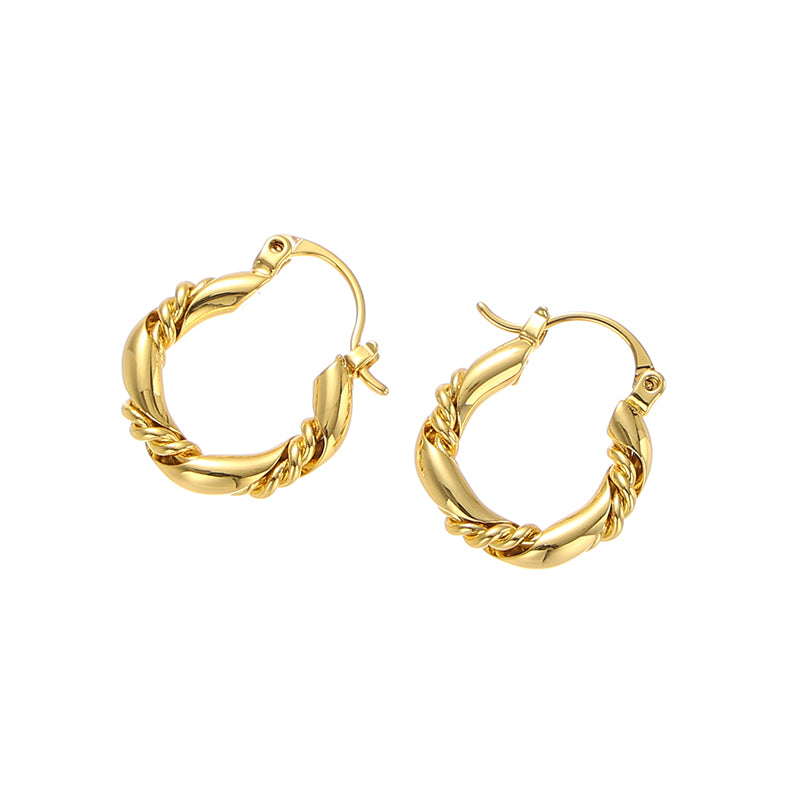 This image displays a pair of twisted round metal hoop earrings in vintage gold from ChicBlingBabe, ideal for adding a bold yet minimalist touch to fall and winter outfits, and perfect for casual or formal settings.