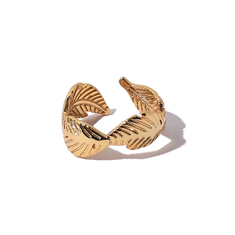 This image features a stunning vintage-inspired feather wide band ring from ChicBlingBabe, designed for those who love unique, statement jewelry. The adjustable open ring is perfect for adding a touch of boho-chic elegance to any outfit, making it an ideal accessory for casual wear, parties, or special events.