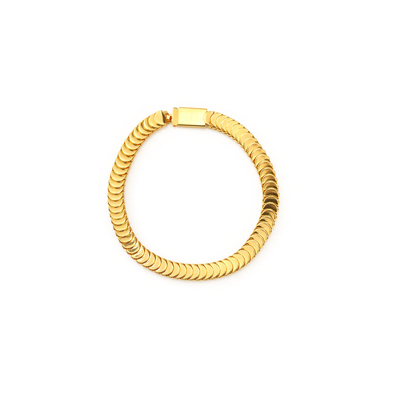 This bold chunky snake chain bracelet from ChicBlingBabe features a high-shine gold-tone finish, making it a striking statement piece for both casual and dressy occasions. Its thick, interwoven links create a luxurious and eye-catching look, perfect for layering or wearing solo.
