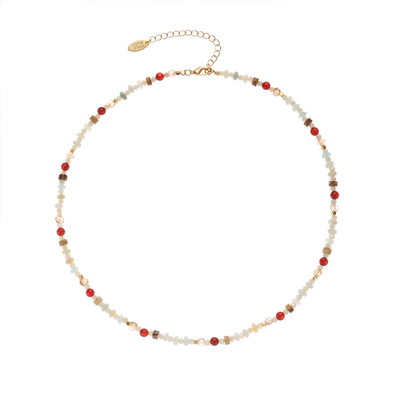 This image features a ChicBlingBabe colorful beaded gemstone necklace with vibrant red agate accents, perfect for layering with other jewelry or wearing alone to add a playful and stylish touch to casual outfits or summer vacations.