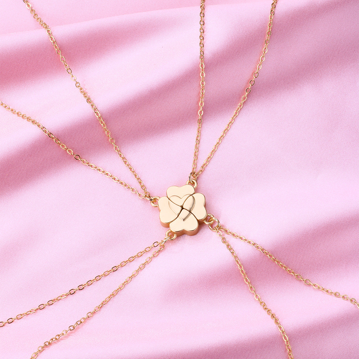This image shows a set of four gold clover-shaped magnetic necklaces from ChicBlingBabe, each pendant forming a part of a four-petal design that connects perfectly with the others, ideal for best friends, family, or group gifts, suitable for birthdays, reunions, or everyday wear, and styled to express love, unity, and lasting bonds.