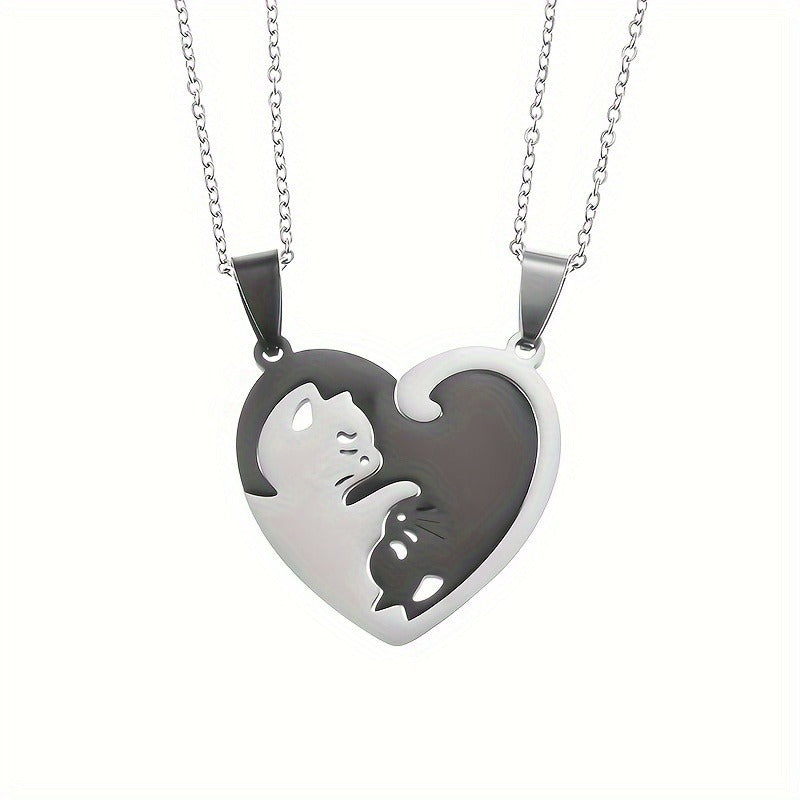 This image displays a pair of matching cat-shaped heart puzzle necklaces from ChicBlingBabe, designed in silver and black tones with interlocking pendants that form a complete heart when joined, perfect for couples to wear as a daily reminder of connection and affection, ideal for anniversaries, Valentine's Day, or relationship milestones.